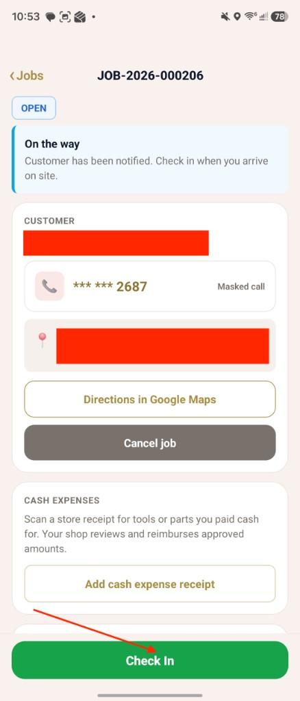 Job details screen showing On the way status and the green Check In button